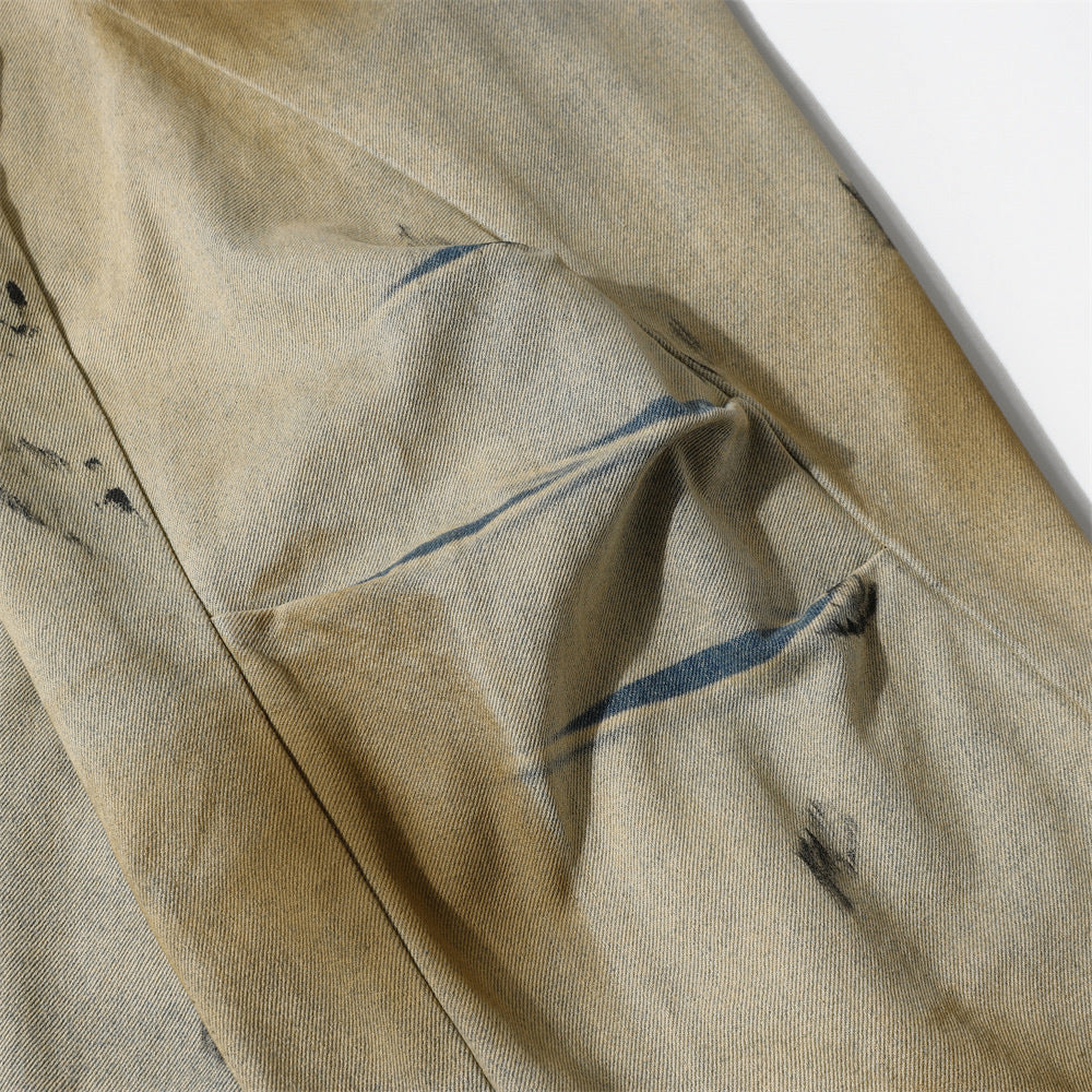 Wide-Leg Distressed Denim Jeans with Mud-Wash Finish and Creased Textured Details