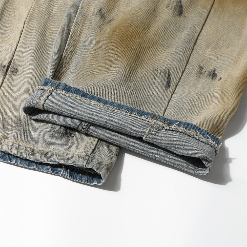 Wide-Leg Distressed Denim Jeans with Mud-Wash Finish and Creased Textured Details