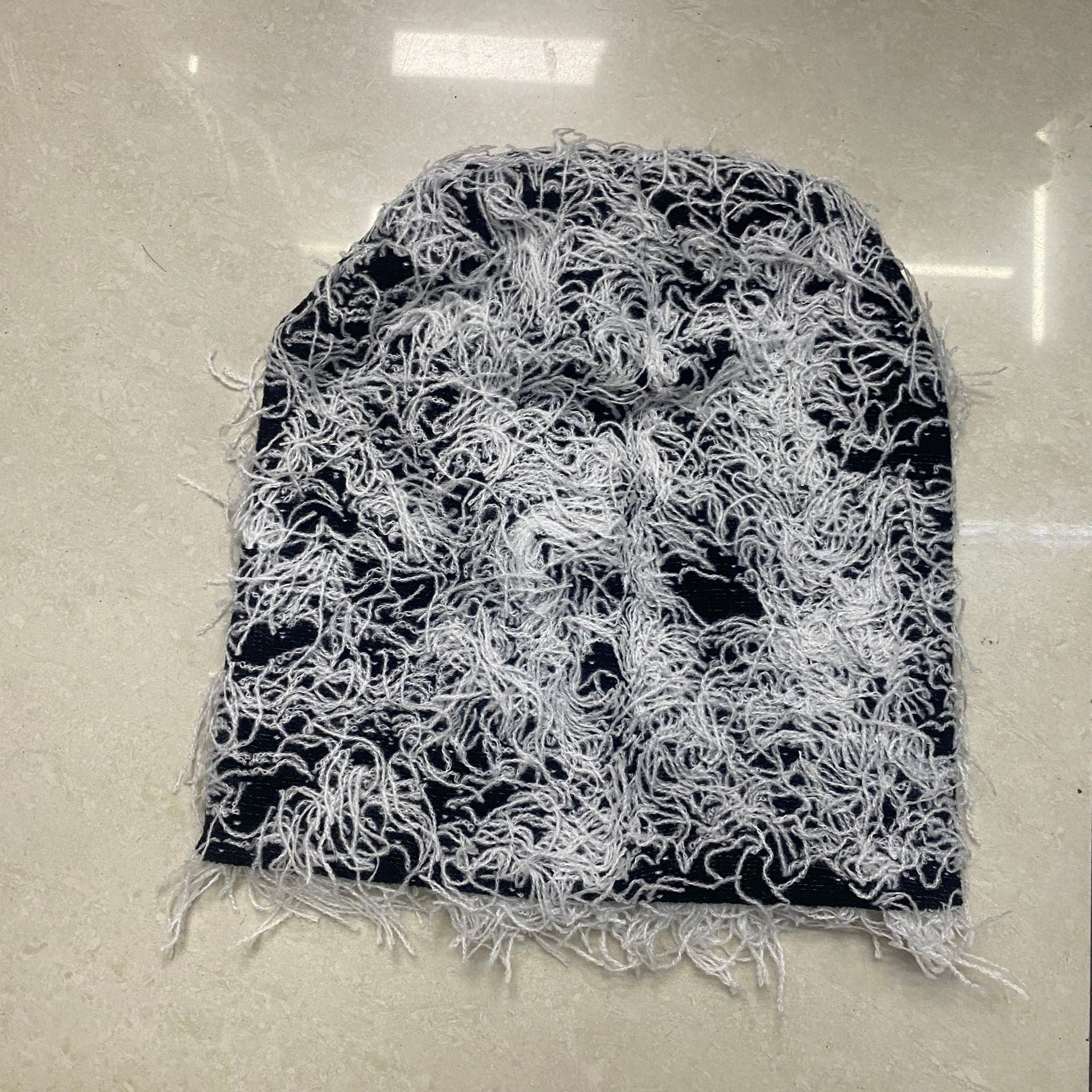 Textured Knitted Beanie with Multi-Color Yarn Design and Cozy Winter Streetwear Style