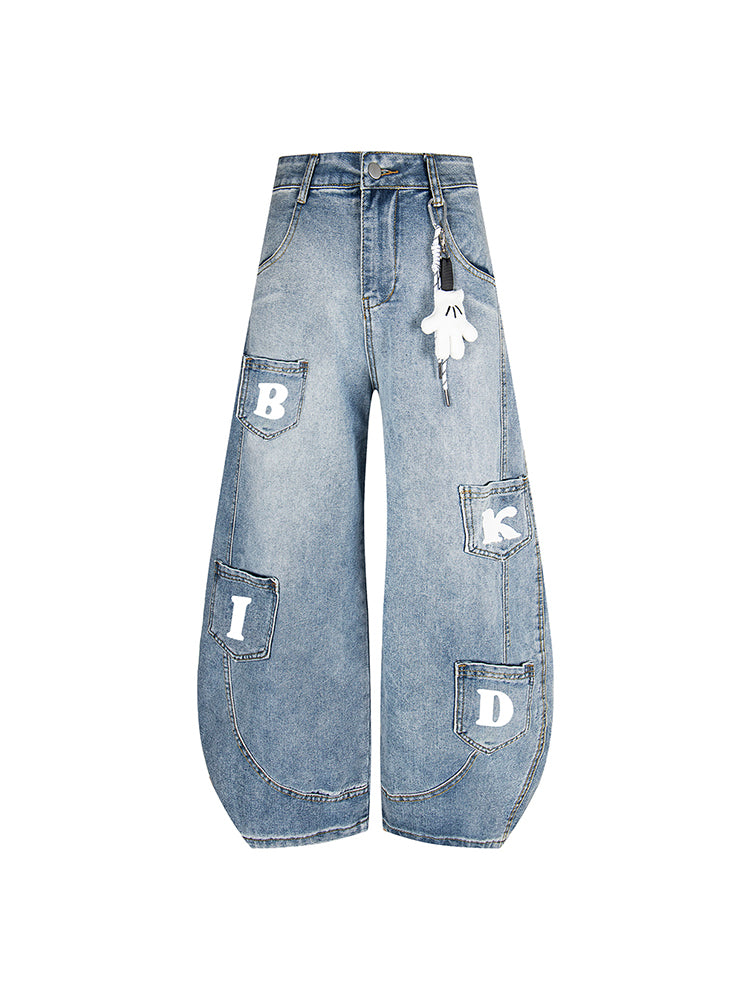 Retro Wide-Leg Denim Pants with Multi-Pocket Patch Details and Playful Streetwear Design